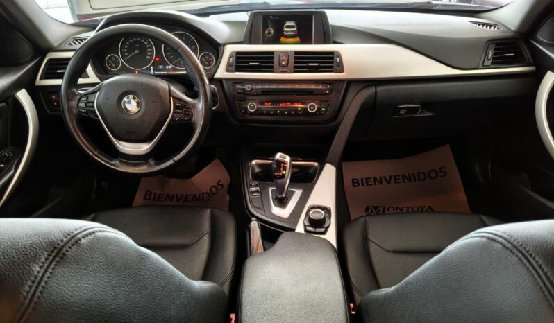 BMW 320IA 2014 lleno