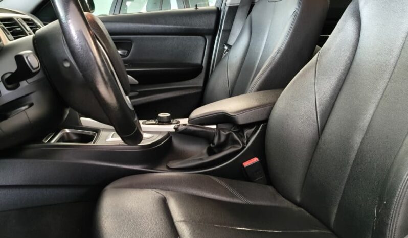BMW 320IA 2014 lleno